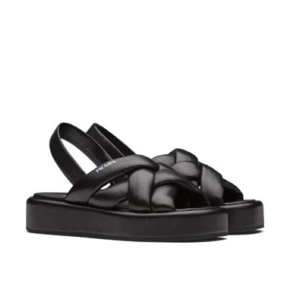 Selling almost as good as new Prada braided woven sandals